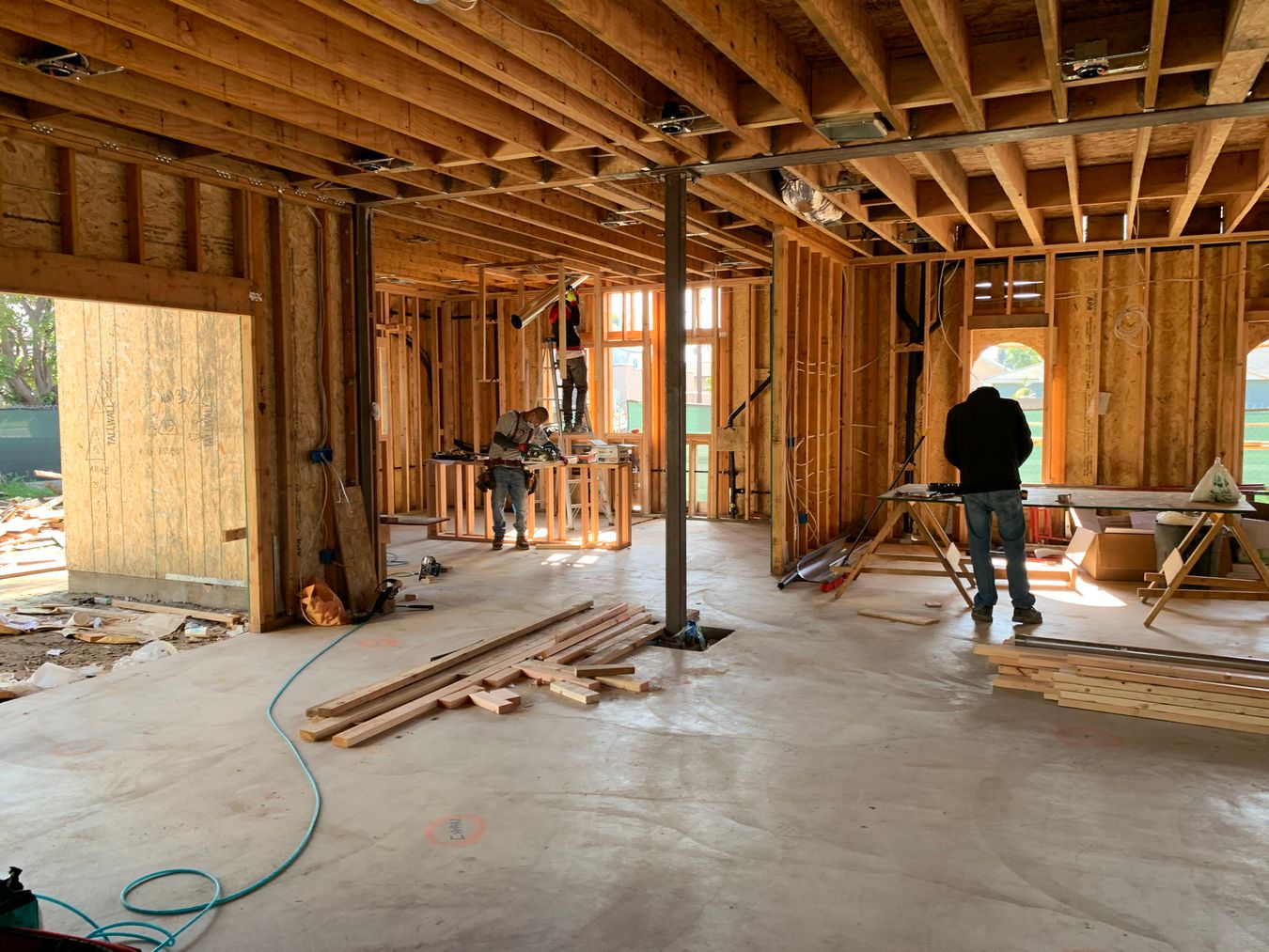 Wood framing construction of a new home addition roof structure