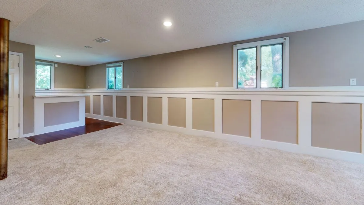 Basement room with windows and natural light